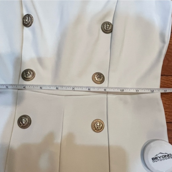 White Symphony Romper with Gold Lion Buttons - Picture 5 of 8